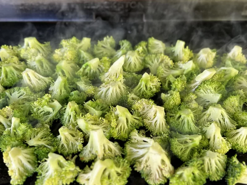 Cook broccoli on the griddle with stalks up!
